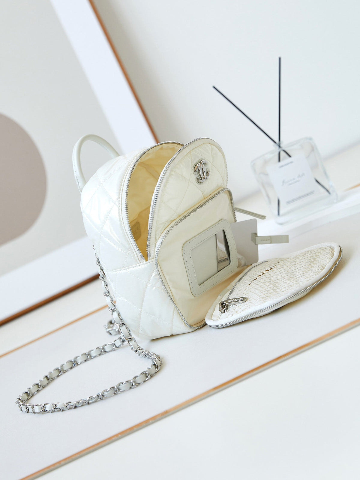 Chanel Backpack 22 in White Fabric Silver Hardware