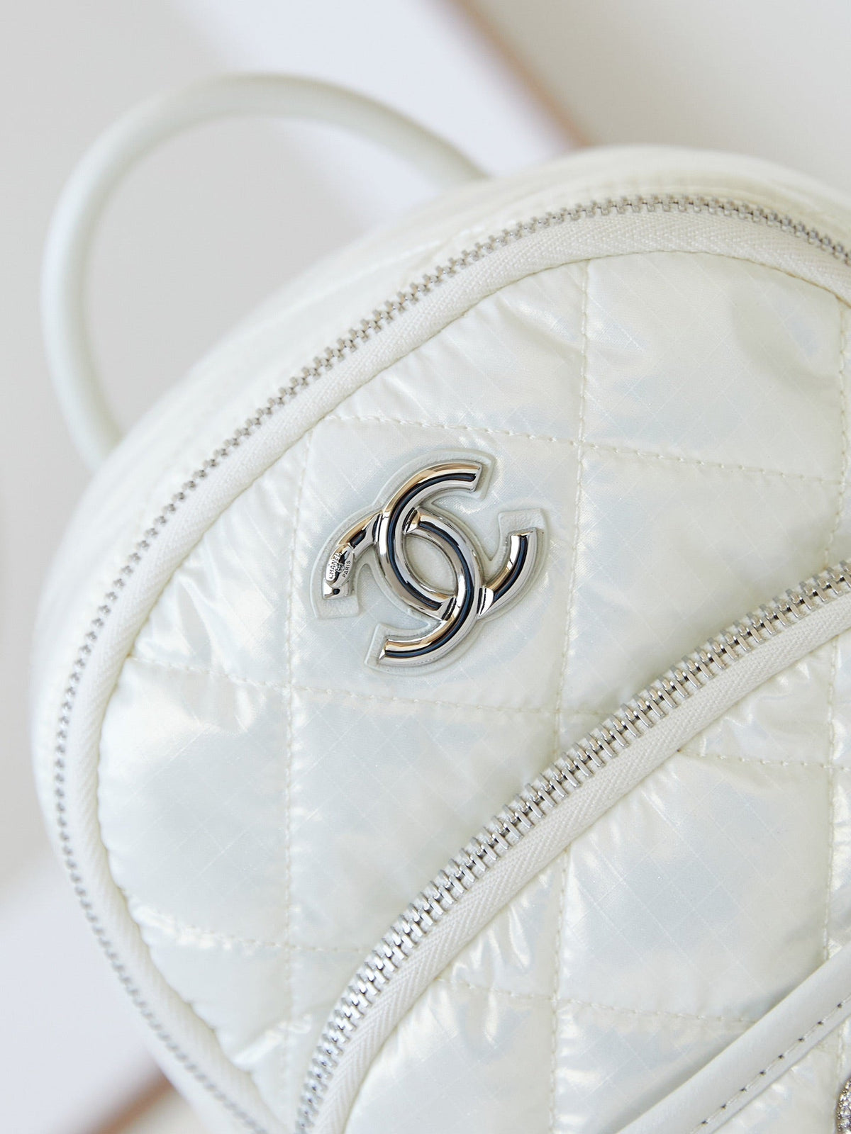 Chanel Backpack 22 in White Fabric Silver Hardware