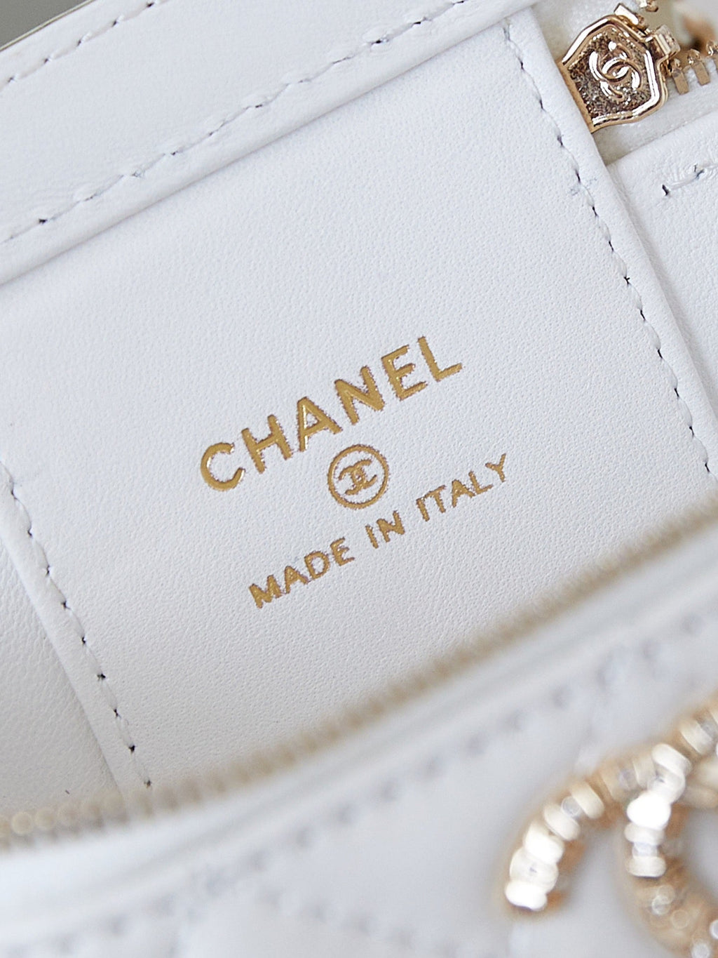 Chanel 25S Mini Vanity Bag 11 cm in White Lambskin with Crystal-Embellished Logo
