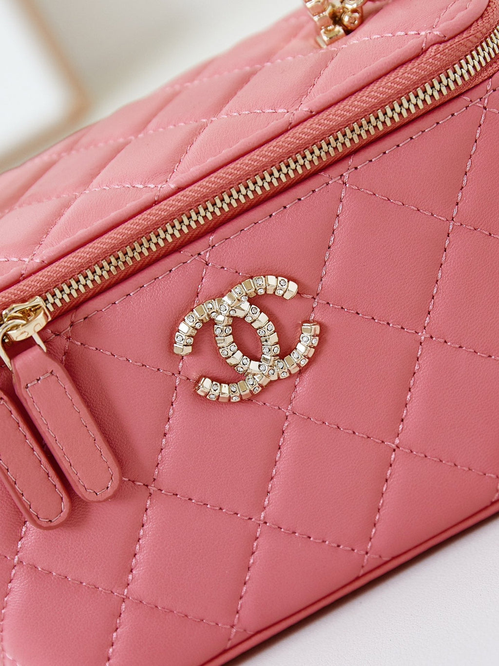 Chanel 25S Mini Vanity Bag 16 cm in Peachy Pink Lambskin with Crystal-Embellished Logo