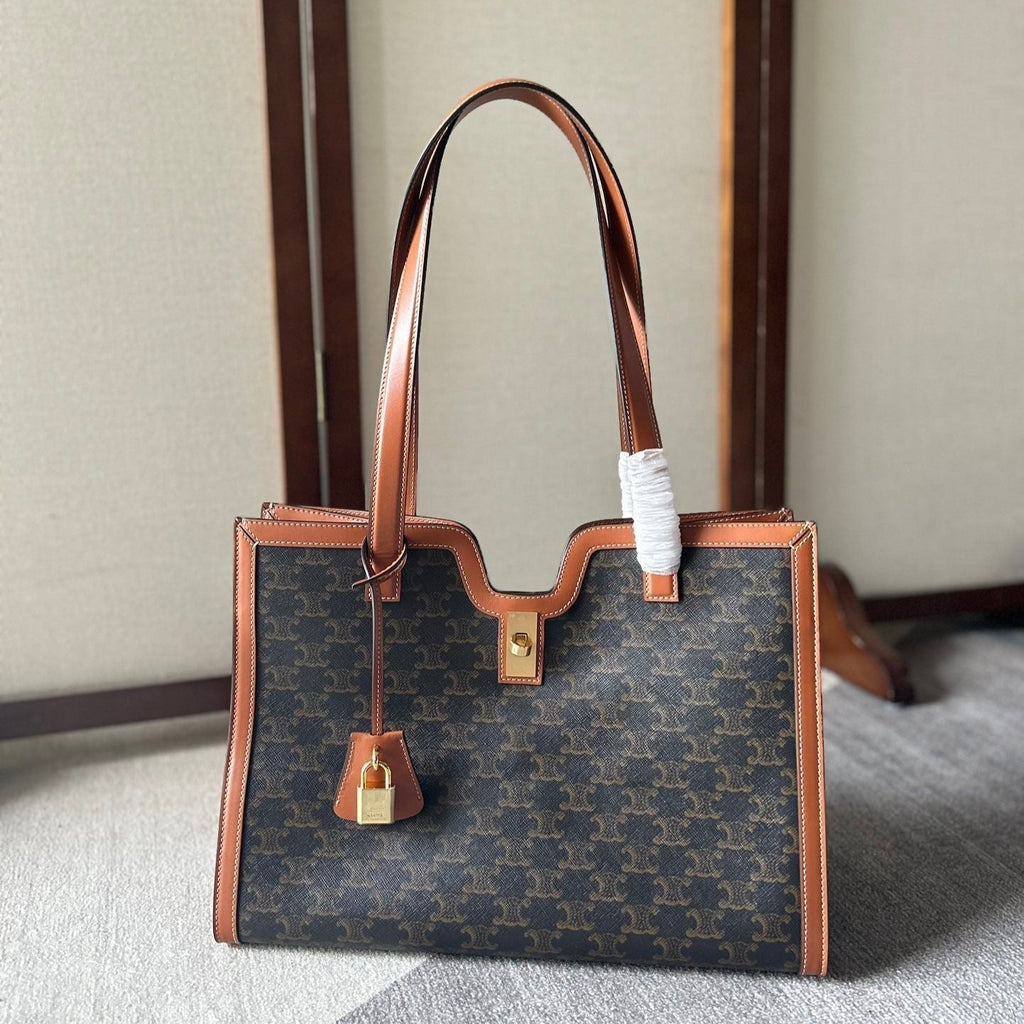 Celine Cabas 37 in Black Triomphe Canvas and Bronze Brown Calfskin Trim Gold Lock Bag