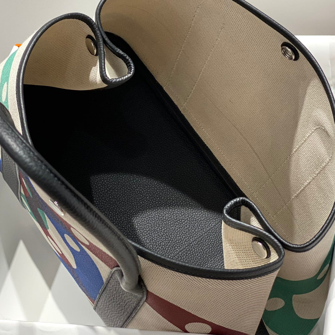 Hermes Garden Party 36 in Multicolor Toile H Canvas Black Calfskin Overlapping Polka Rings Print Bag