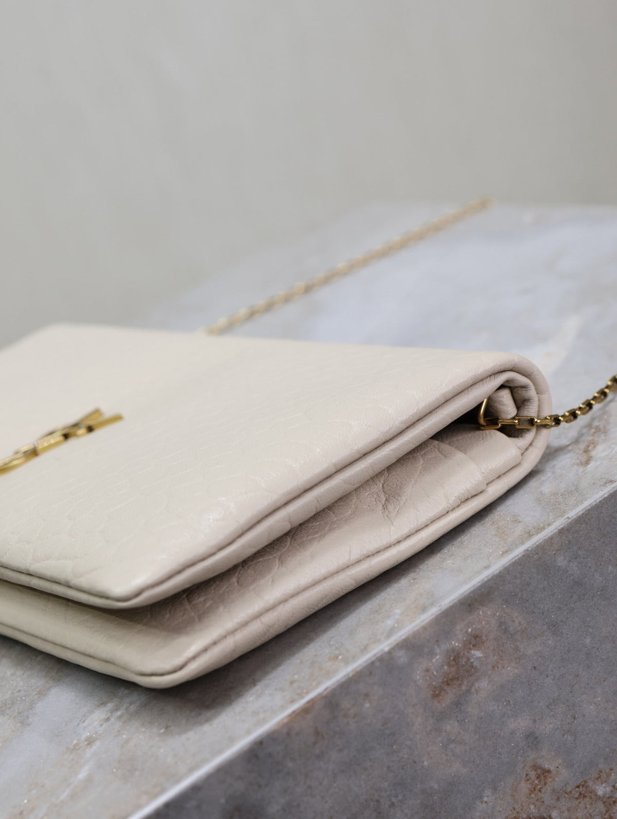 Saint Laurent Calypso Pouch 24 in White Elephant Textured Lambskin Gold Logo